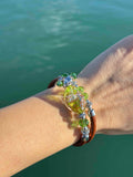 Bracciale con perle in vetro di Murano verde e oro