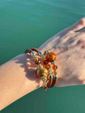 Bracciale con perle in vetro di Murano rame e oro
