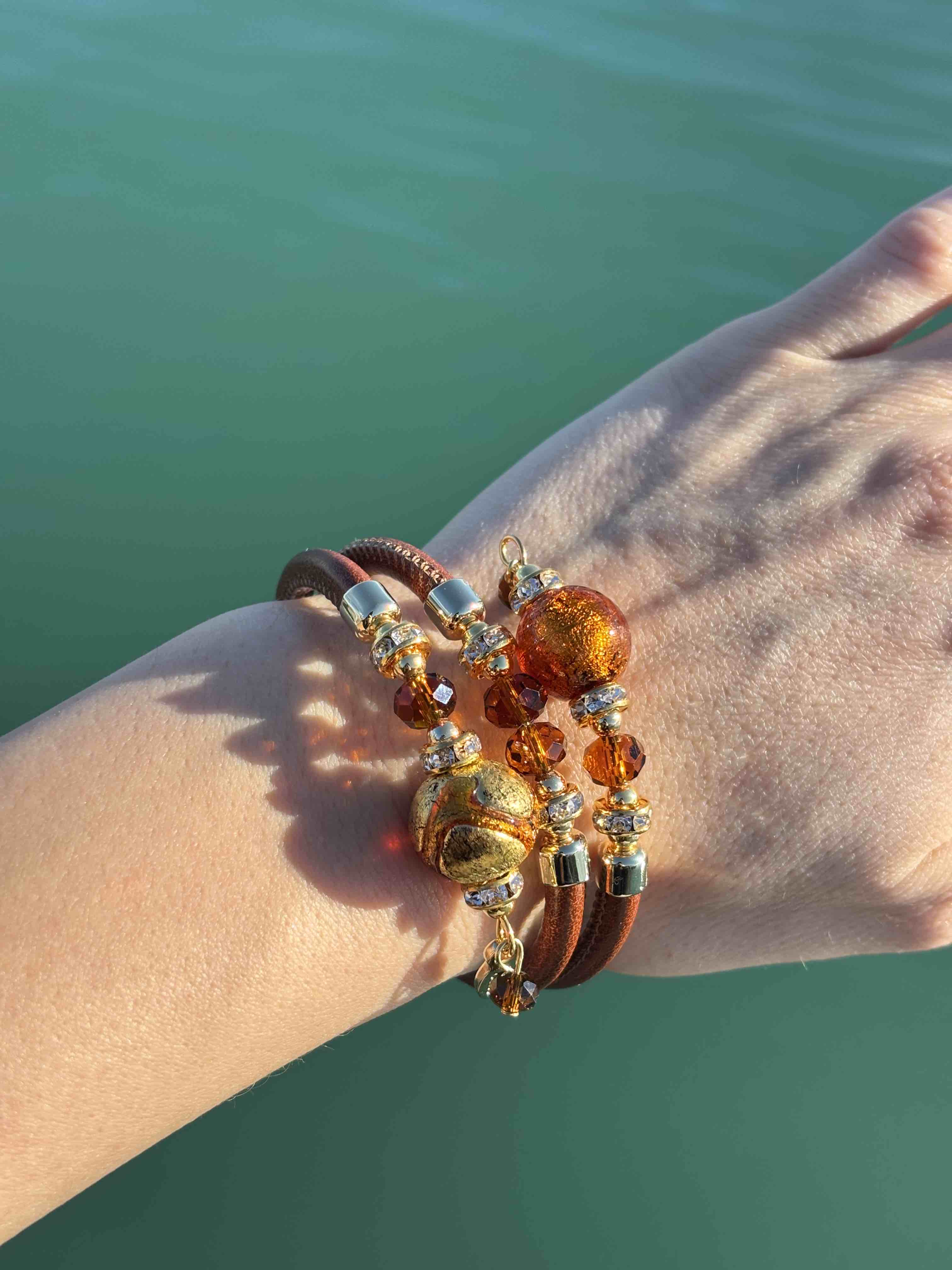 Bracciale con perle in vetro di Murano rame e oro