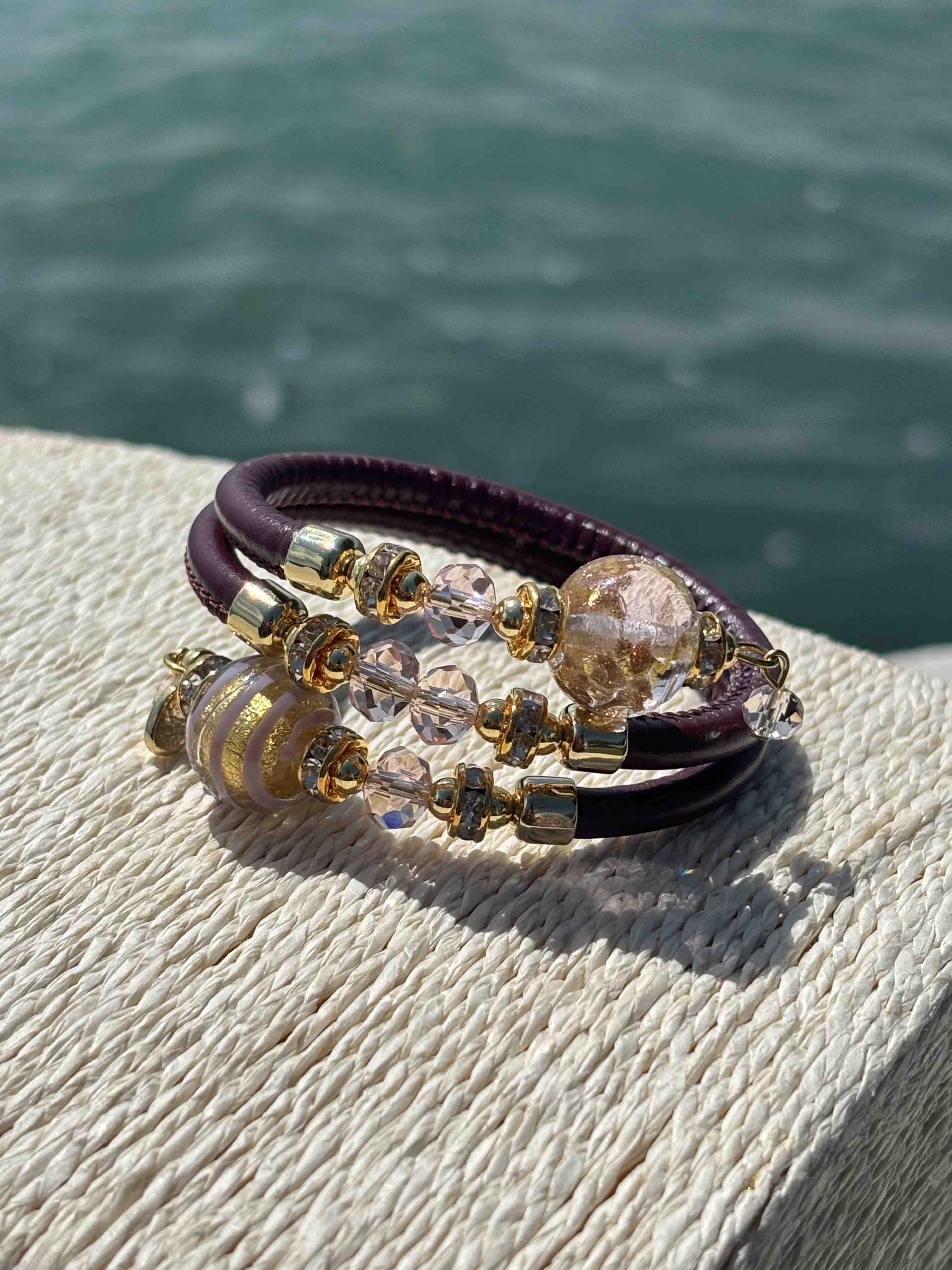 Bracciale con perle in vetro di Murano rosa, borgogna e oro