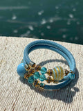 Bracciale con perle in vetro di Murano azzurro e oro