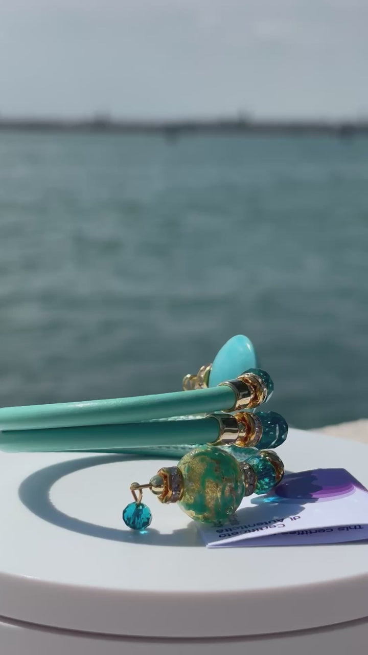 Bracciale con perle in vetro di Murano turchese e oro